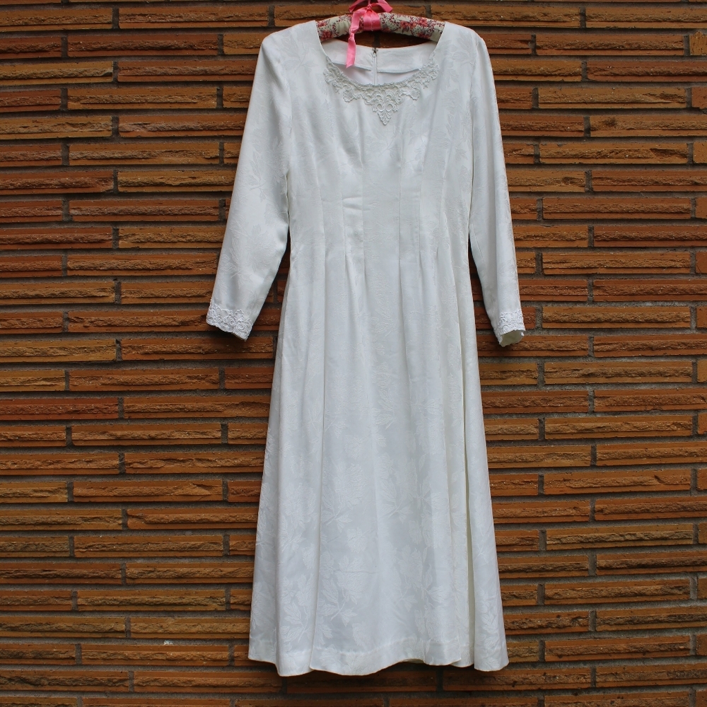 Handmade white satin sleeved dress